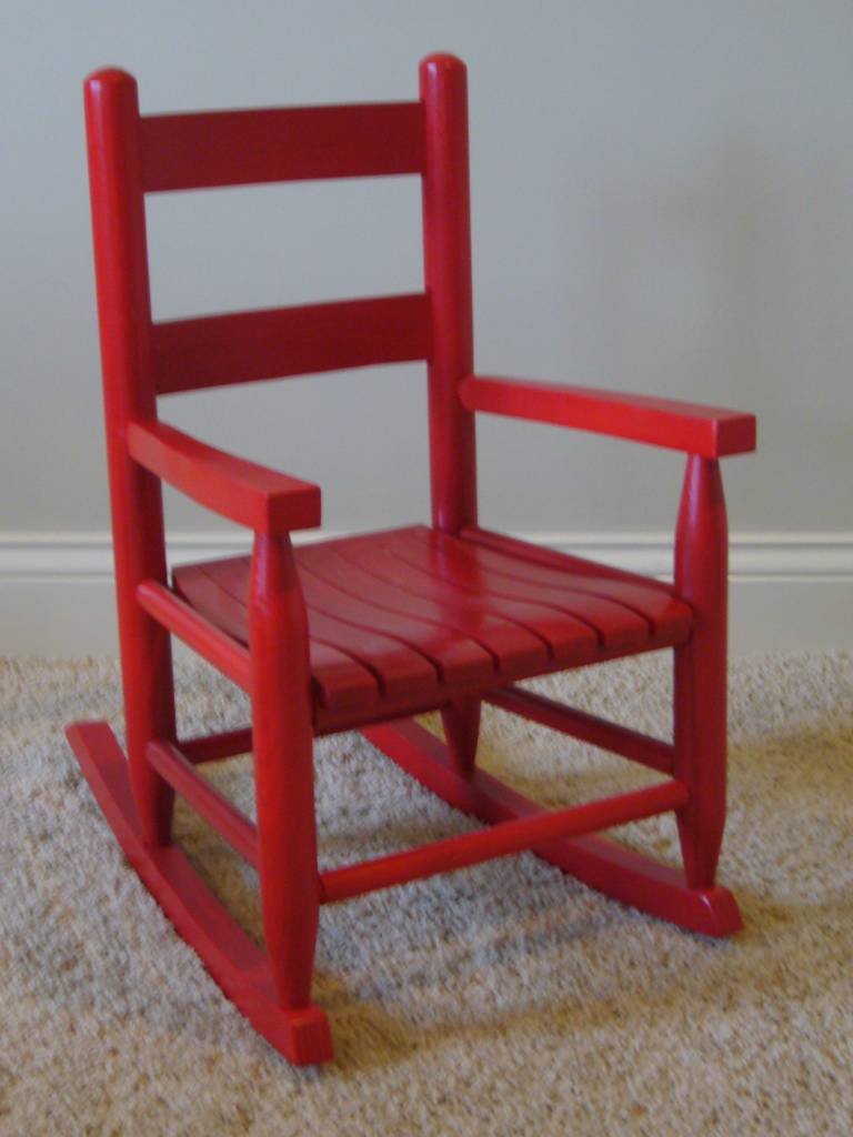 childs red rocking chair